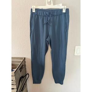 CRZ Yoga blue joggers. Best for a M or fitted L. Waist measures 15.5in. Inseam i